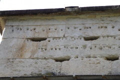 Detail of the inscription of the Arch of Augustus.