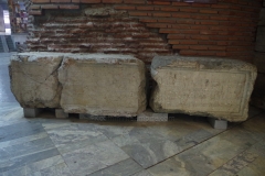 Inscription noting the construction of the walls, displayed near the east gate.