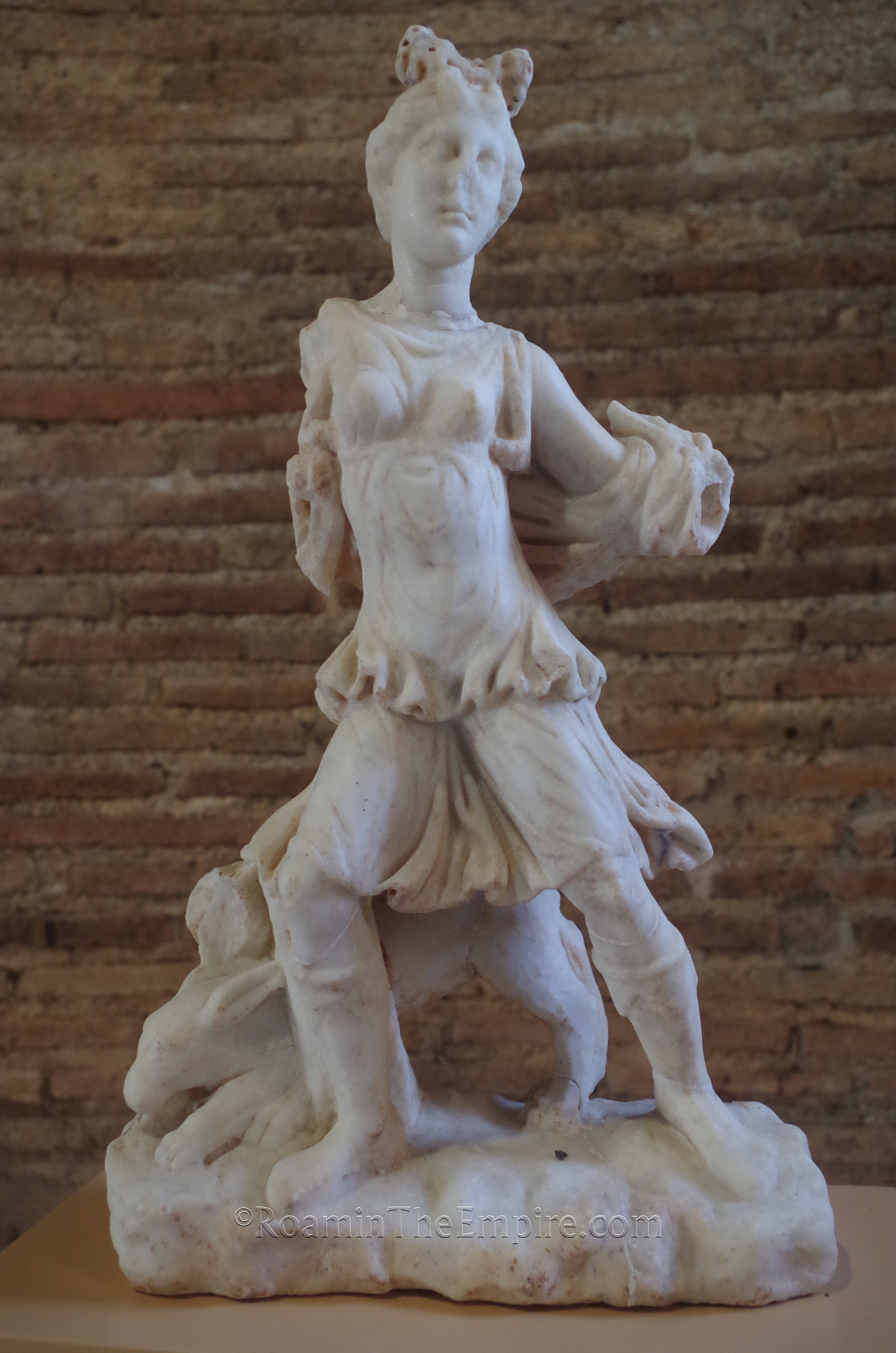 Statue of Artemis Kynegetis from Room II of the Roman baths. Dated to the 2nd century CE. Archaeological museum.