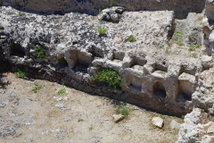 Votive niches west of the Altar of Hieron II.