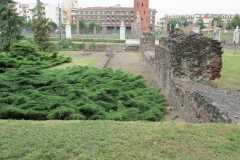 Section of city wall adjacent to the theater and Porta Palatina.