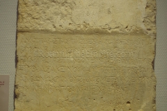 Greek metric dedication of an altar of Hestia mentioning a temple to Serapis and found in the area of the Chiesa San Pancrazio. Displayed in the theater antiquarium.