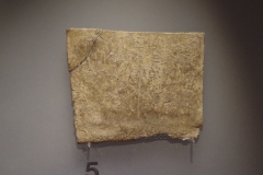 Oracular tablet from Dodona dating to the 4th century BCE. This tablet contains the answer to a question, possibly about sea trade, in which the pilgrim is encouraged to continue as they will prosper. Archaeological Museum of Ioannina.