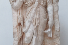 Relief depicting a priestess of Isis. Dated to the 2nd century CE. Museo Orto Lapidario.