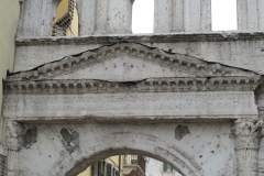Inscription above the exterior of the north portal of the Porta Borsari.