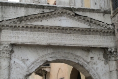 Inscription above the exterior of the south portal of the Porta Borsari.