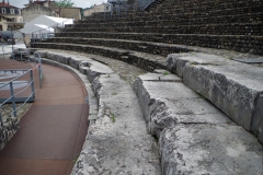 Original stone facing of the seating of the theater.