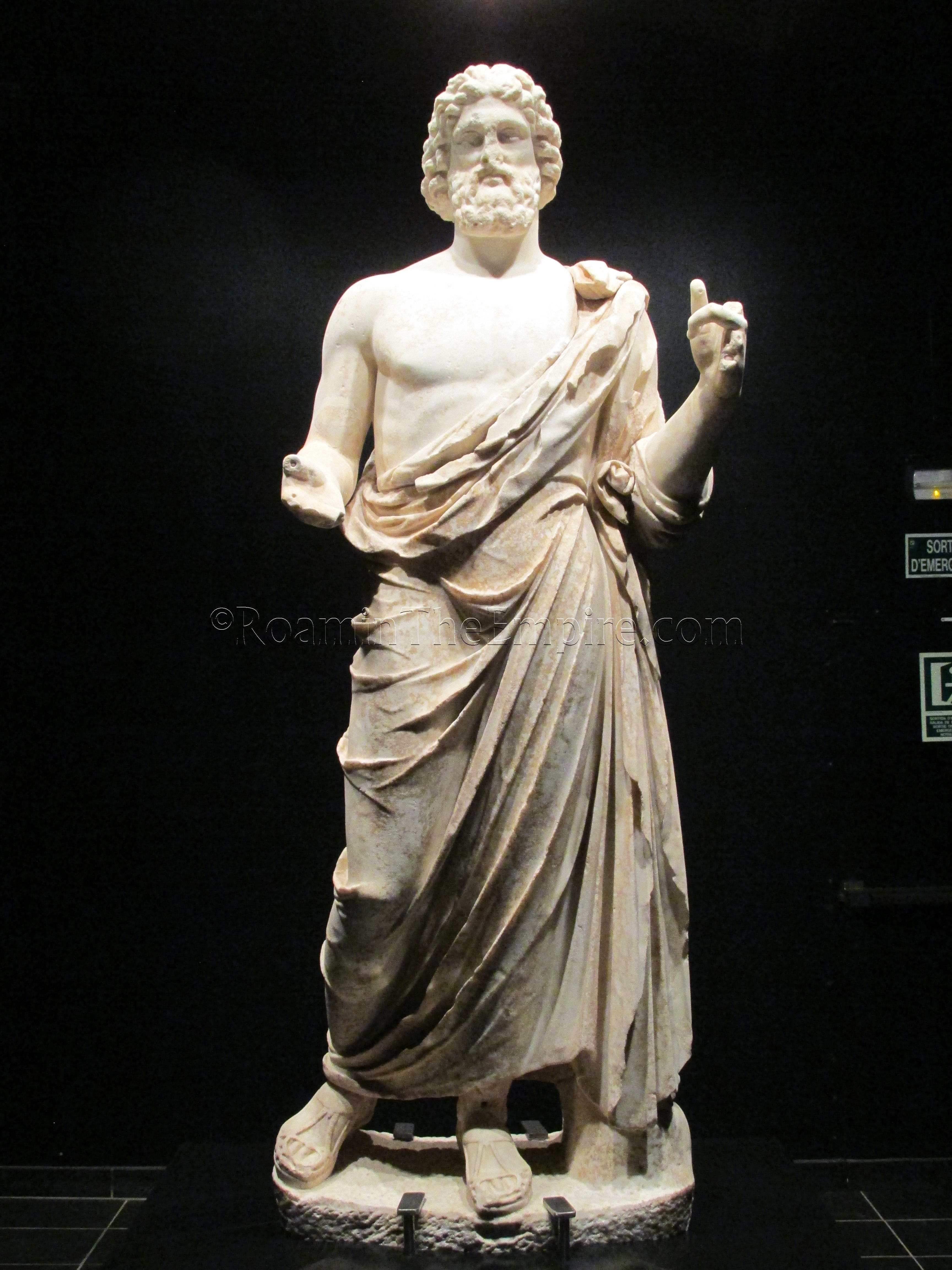 Statue of Asclepius, displayed in the museum. Emporiae. Emporion