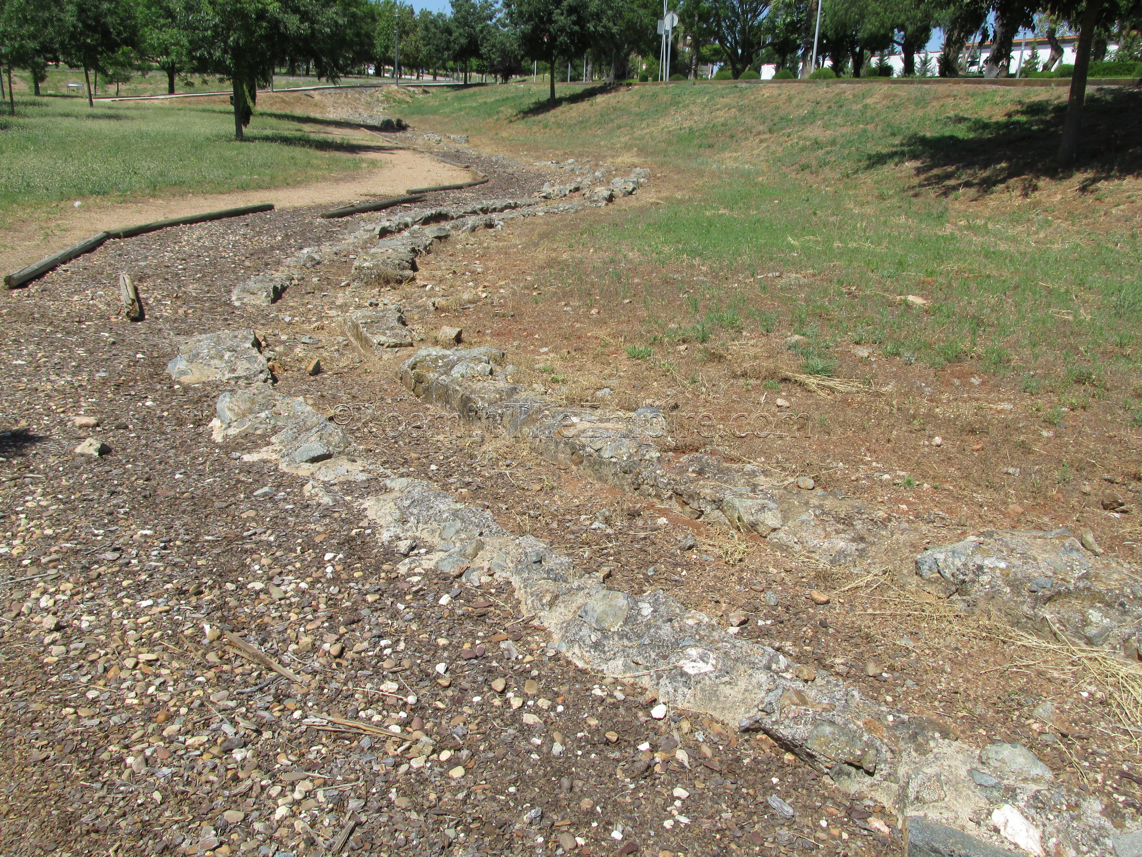 Course of the Proserpina Aqueduct through a park.