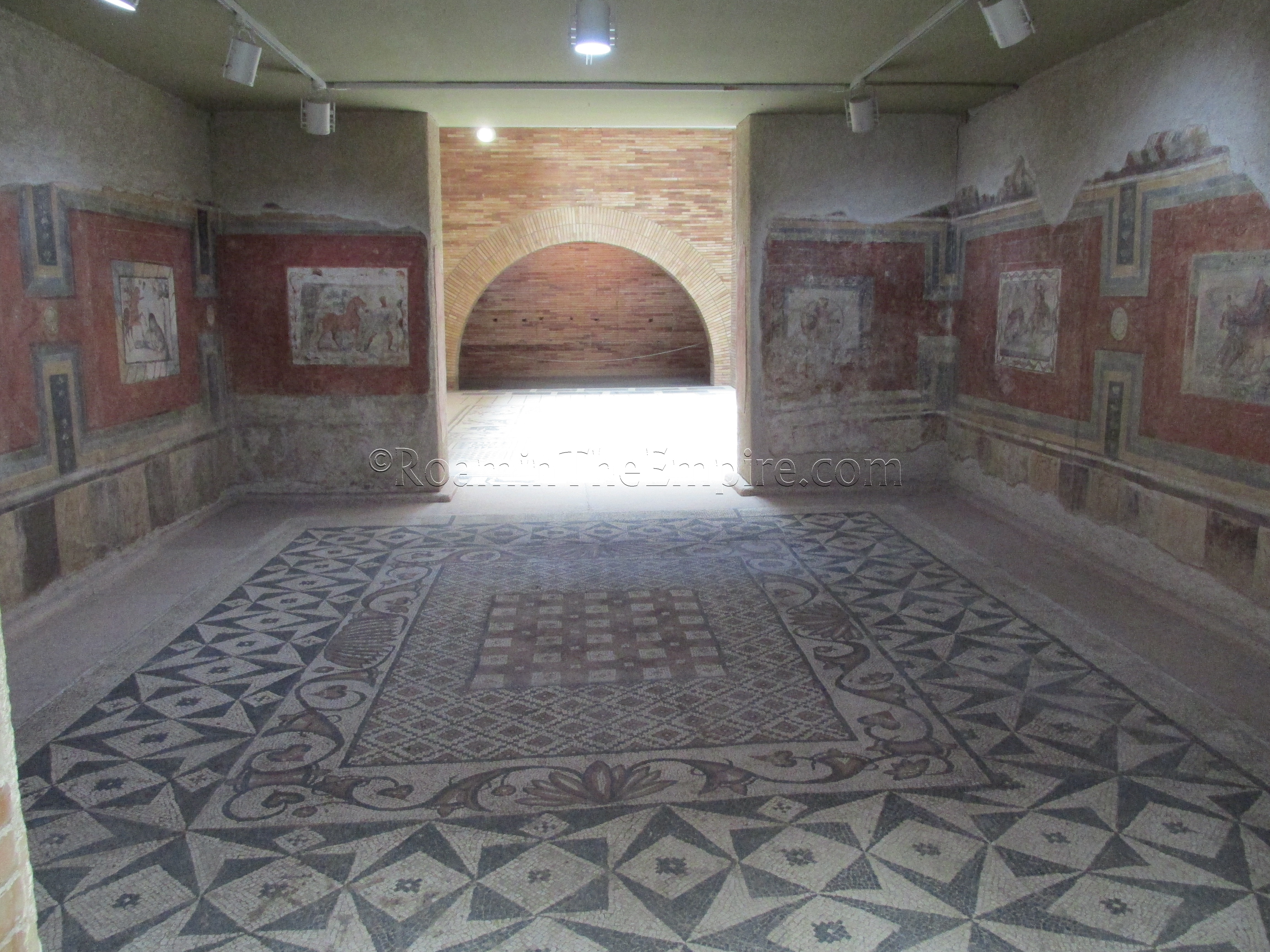 Recreation of a room with wall paintings and mosaic from the 4th century CE. Augusta Emerita.