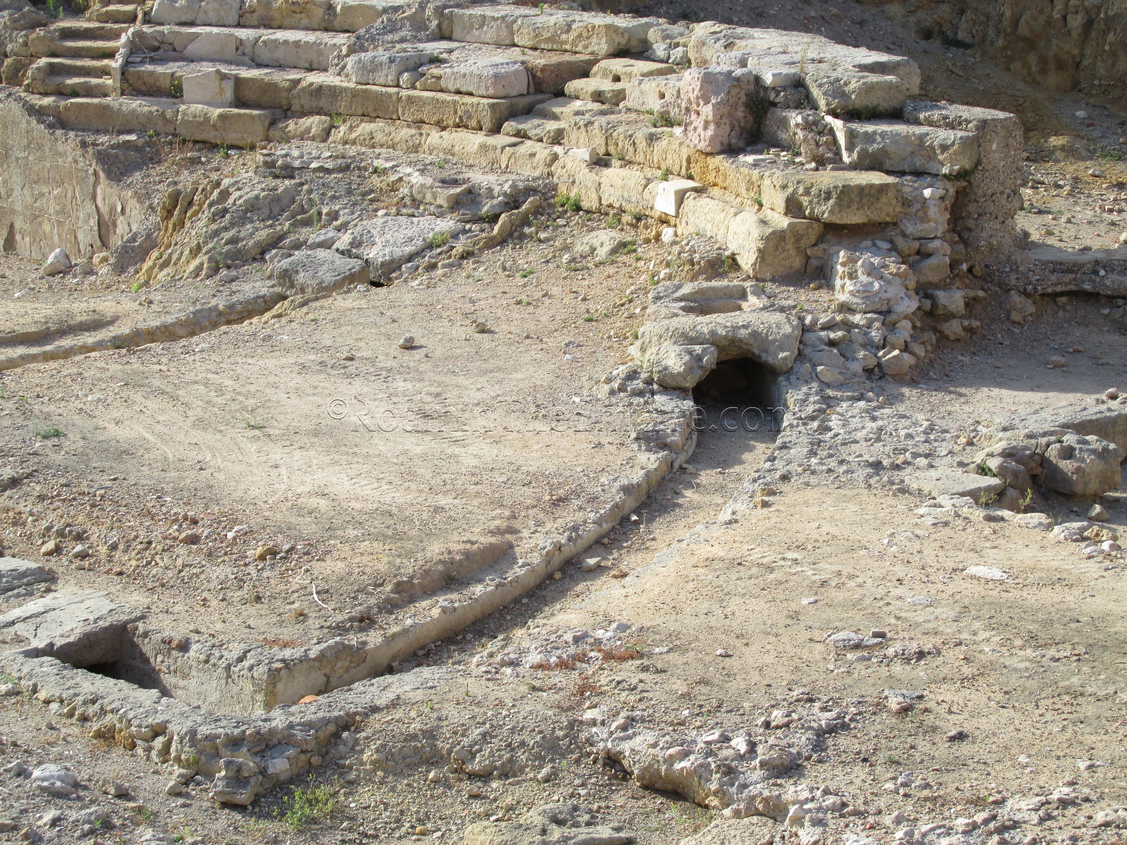 Drainage channel around the orchestra of the theater. Tarraco.