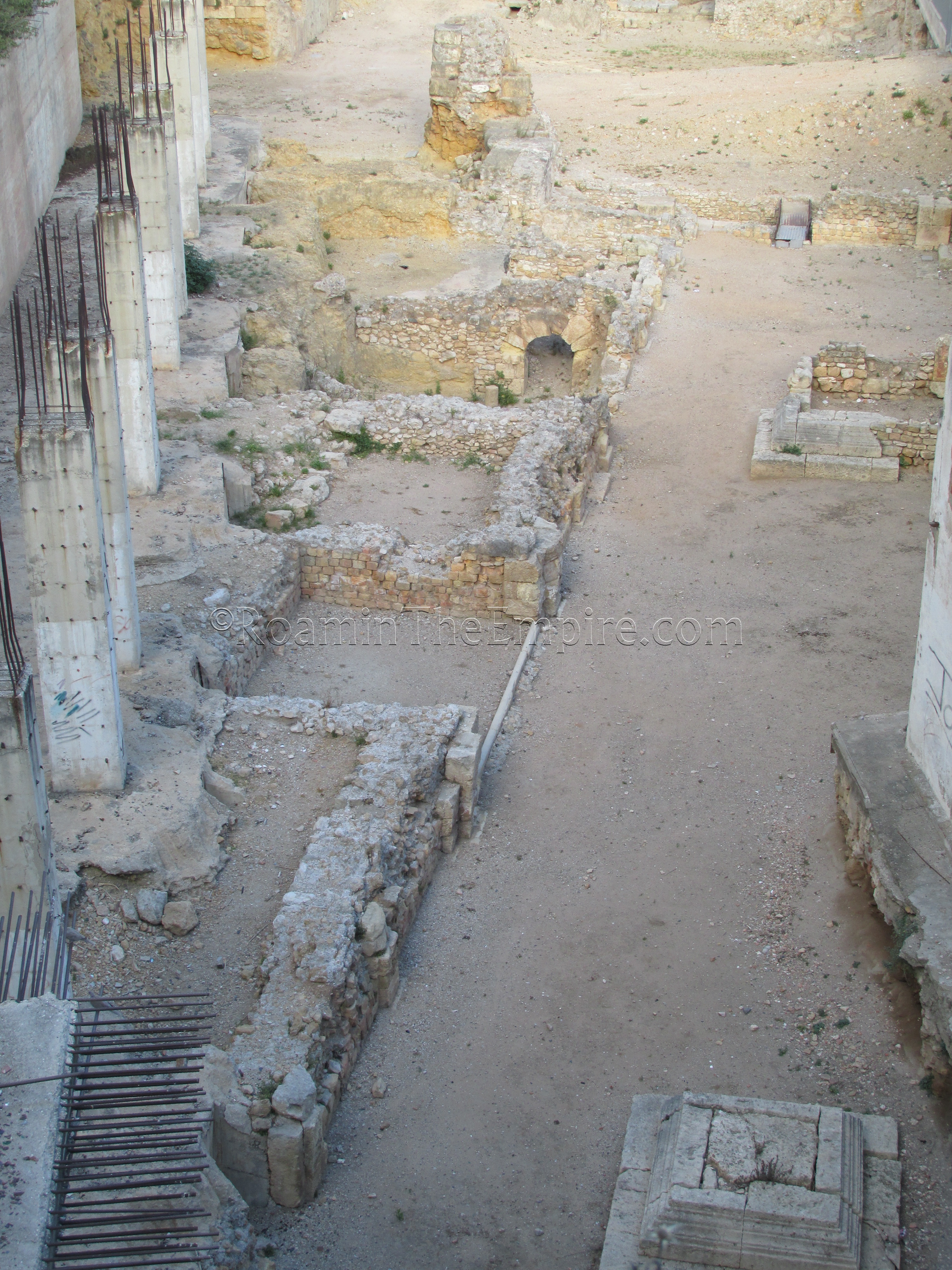 Structures to the west of the theater.