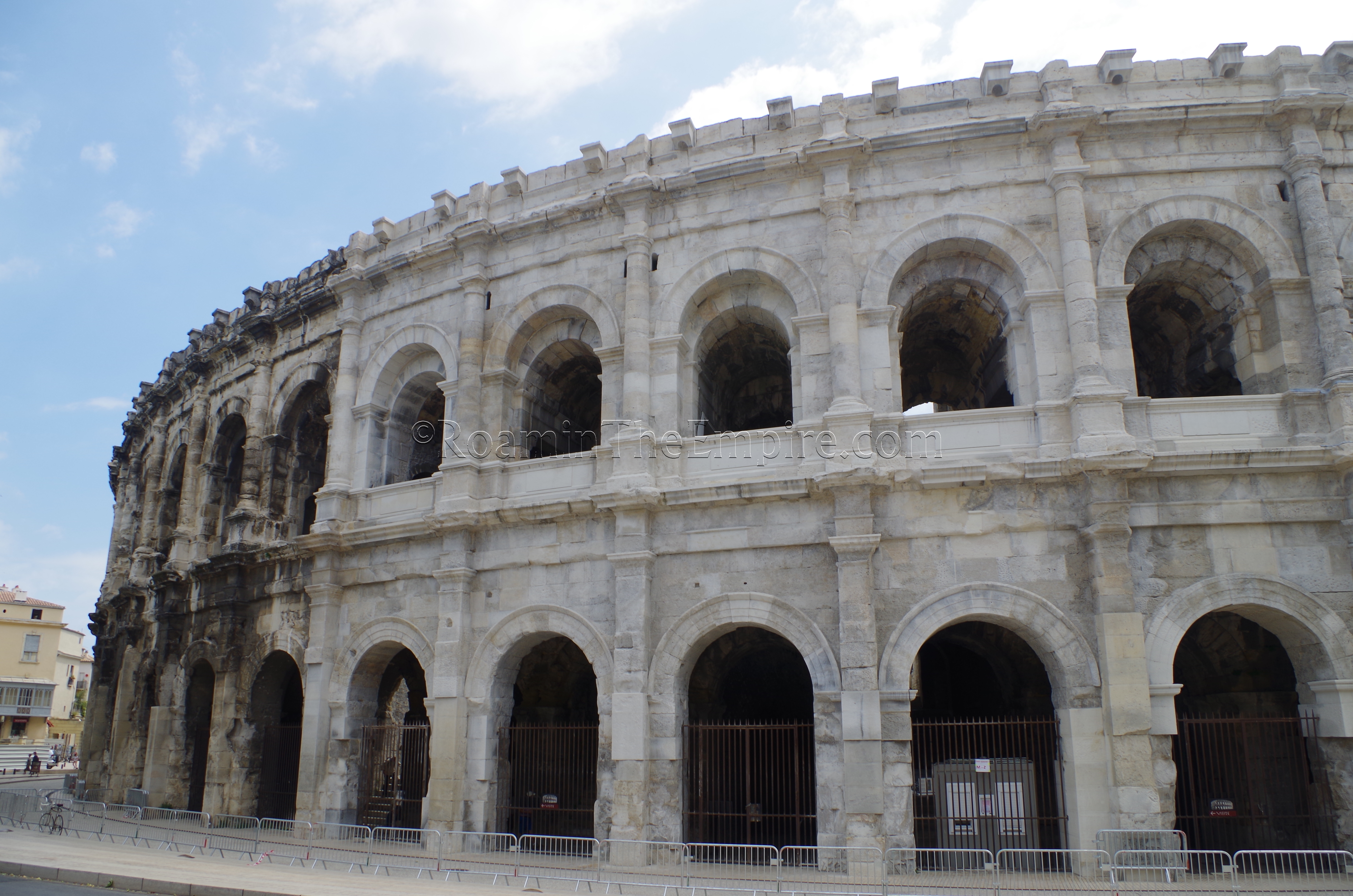 Amphitheater, with restored and unrestored portions. Nemausus. Nîmes.