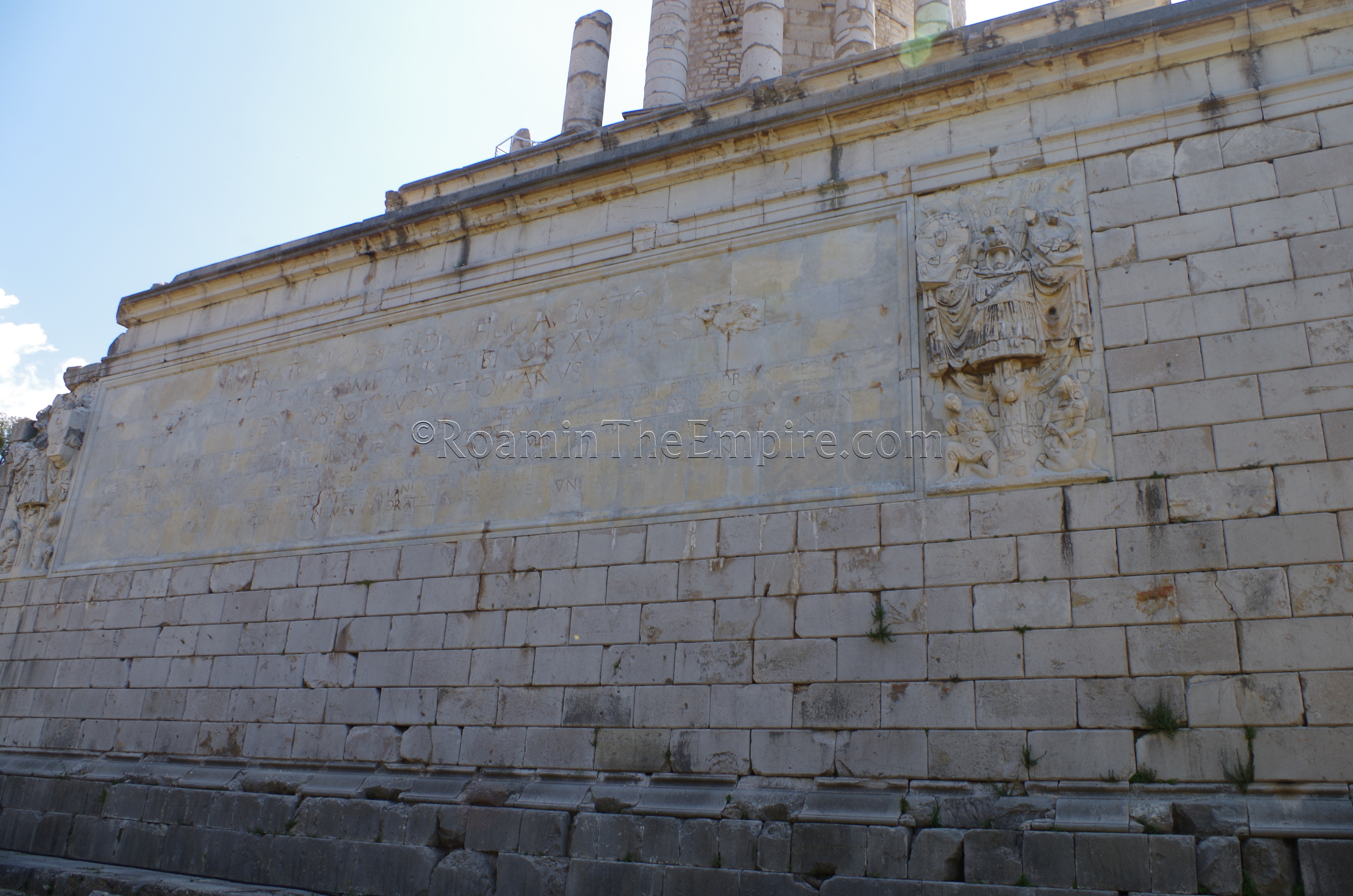 Inscription and reliefs on the west side of the Tropaeum Alpium. La Turbie.