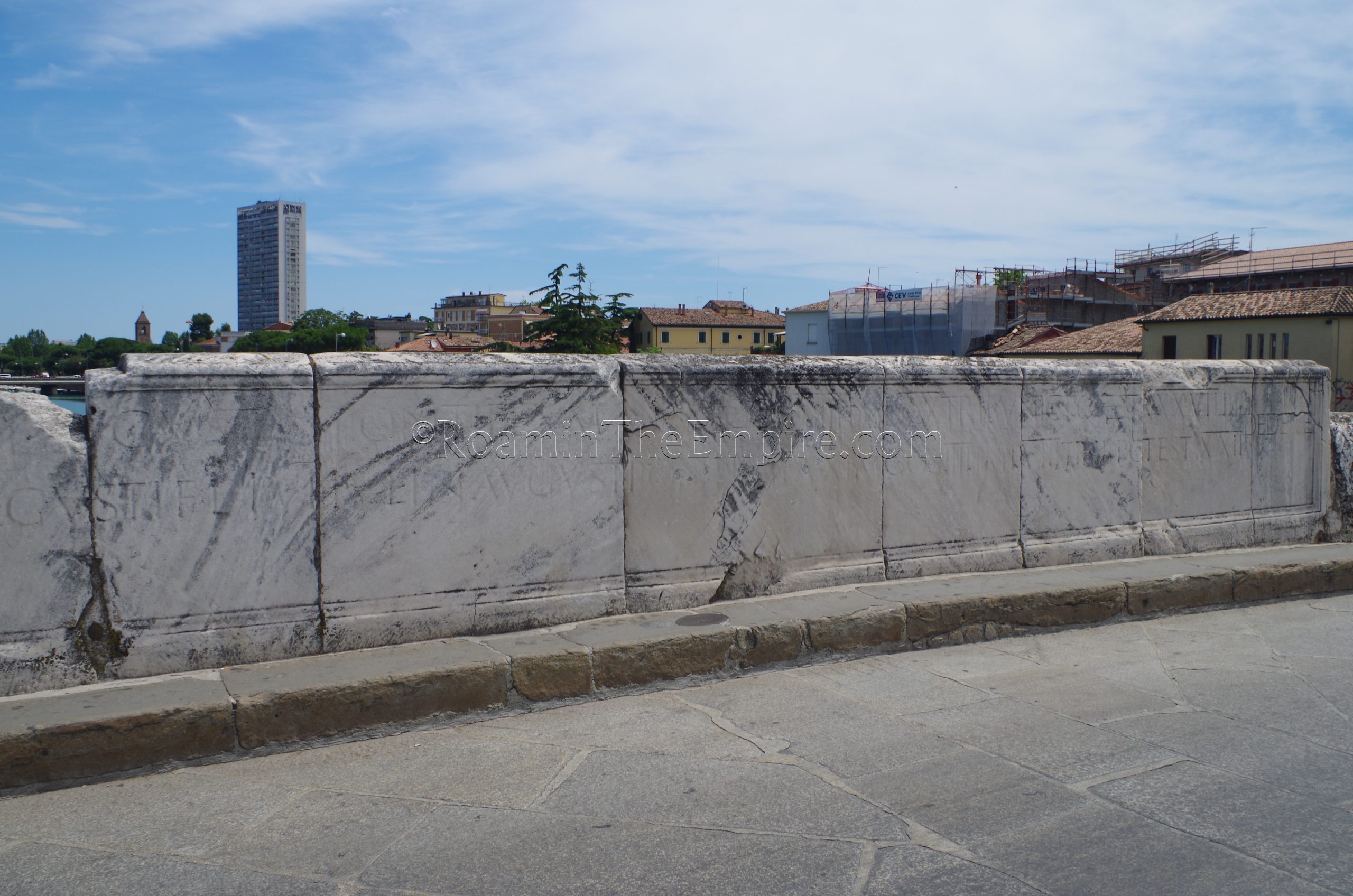 Inscription on the parapet of the Ponte di Tiberio.