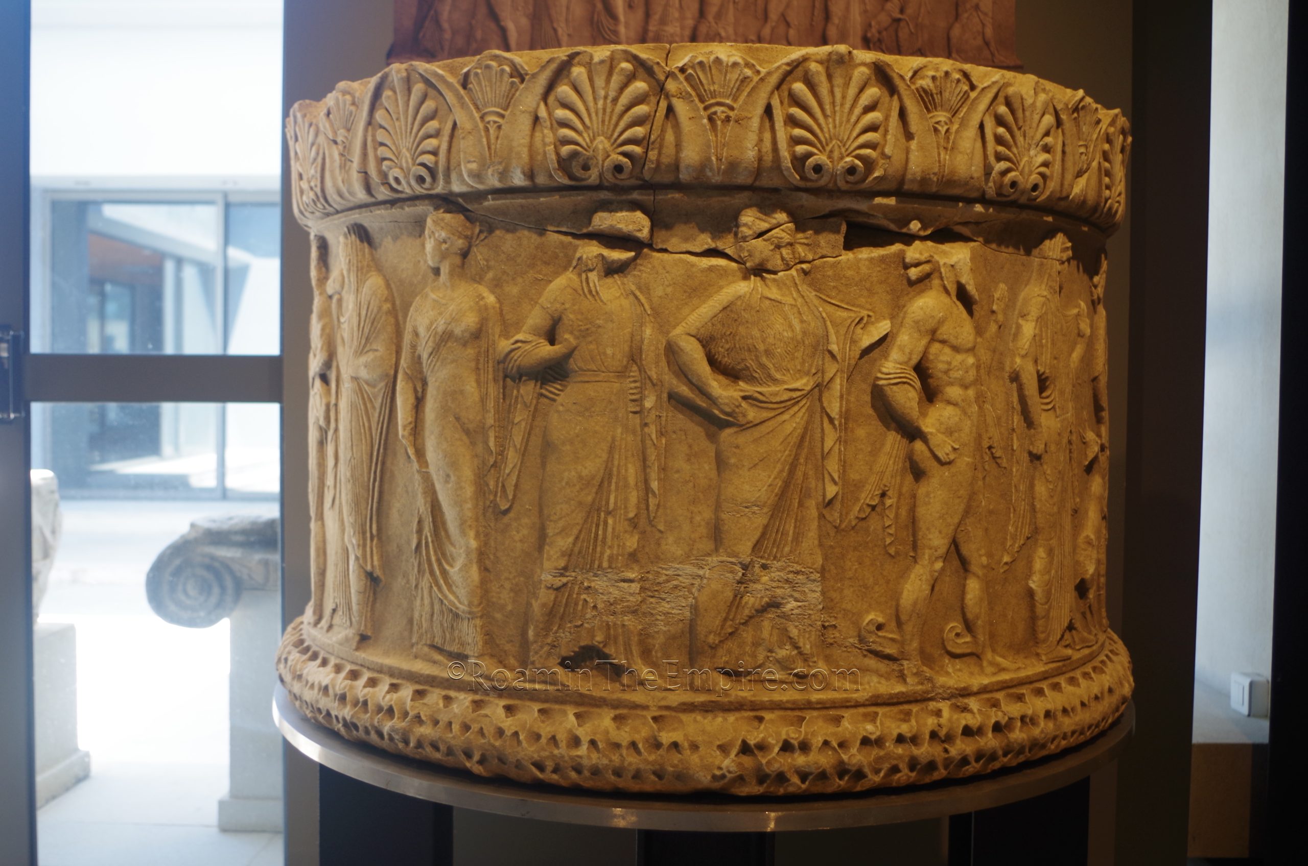Marble base depicting 10 gods and heroes. Found in the excavations of the Augustan tropaeum; possibly part of the decoration of the altar to Apollo. Archaeological Museum of Nicopolis.