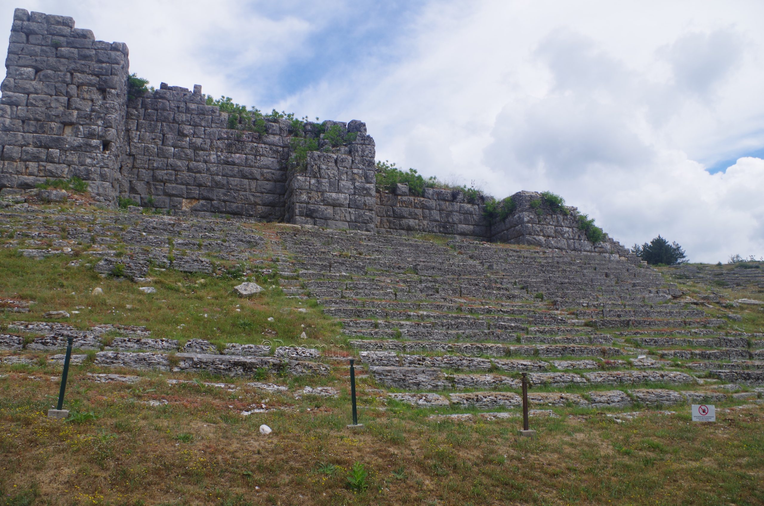 Northern seating of the stadium below the retaining wall of the theater. 