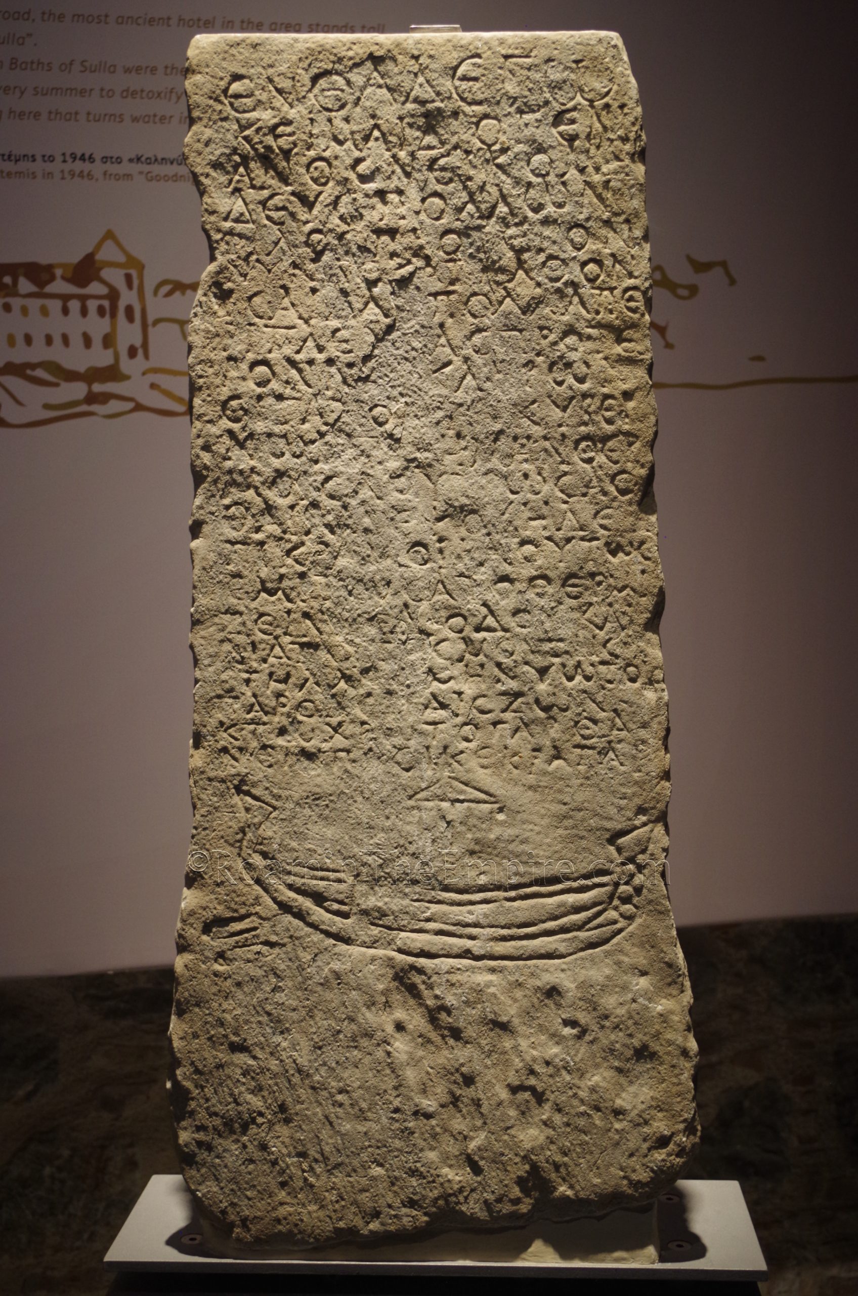Funerary inscription for the Diogenianus, a sailor from Nicomedia. He complains that he came to Aedepsus to be cured in the baths, but was not. From Aedepsus. Dated to the 4th to 6th century CE. New Archaeological Museum of Chalkis "Arethousa."