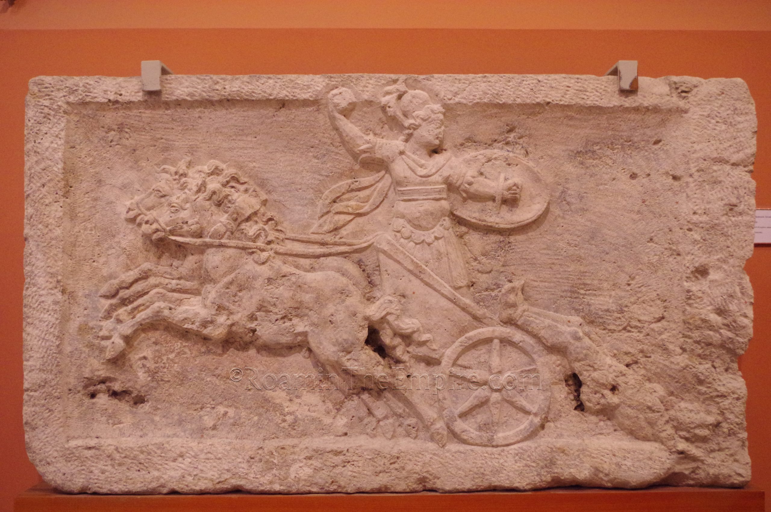 Part of a funerary monument depicting Achilles dragging the body of Hector. Found in Dunapentele. Dated to the second half of the 2nd century CE. Magyar Nemzeti Múzeum.