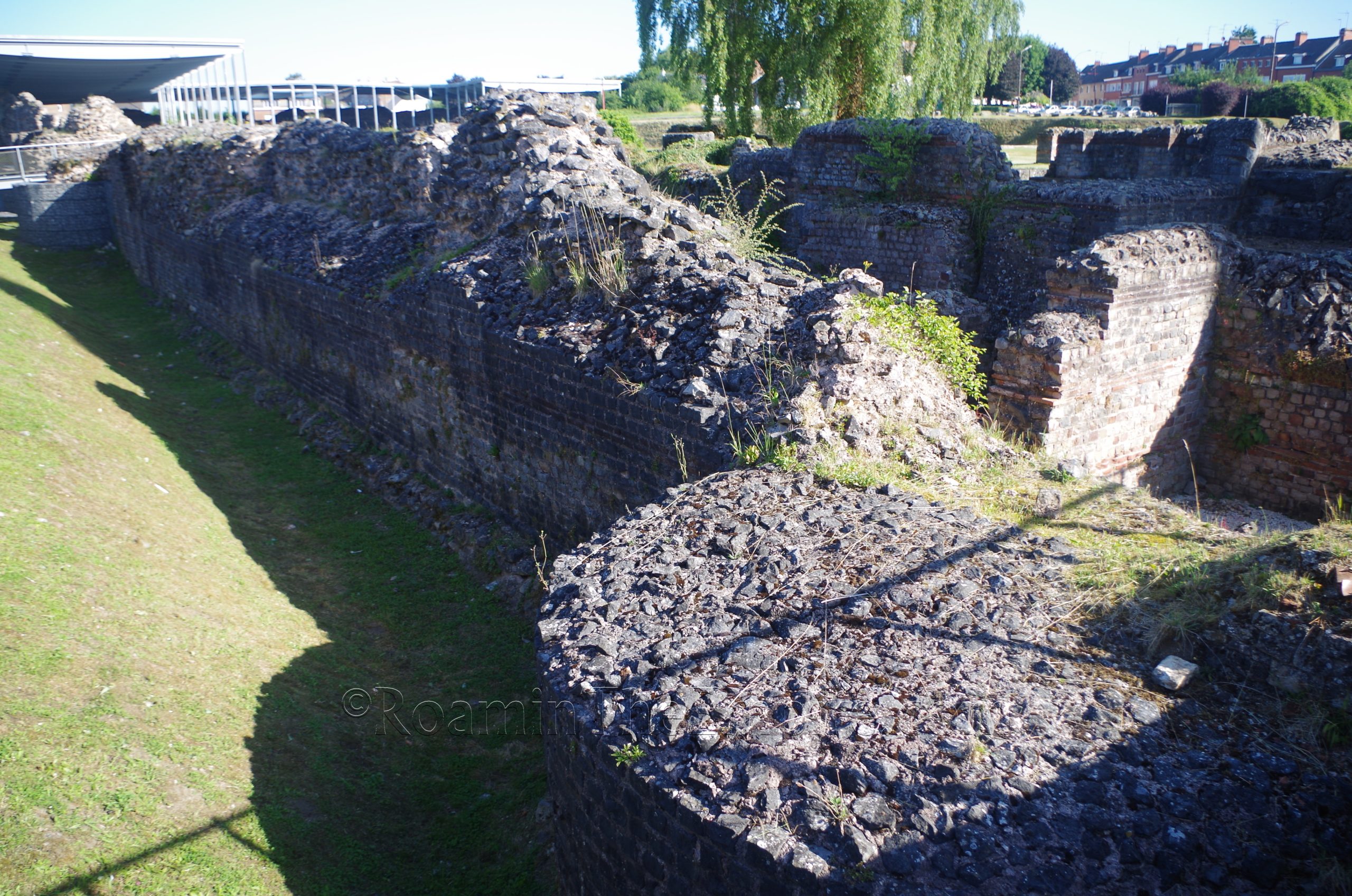Remains of the 3rd-4th century walls enclosing the forum.
