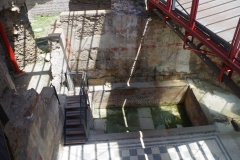 Basin and wall painting remains at the ludus.