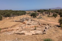 Roman buildings north of the L-shaped cistern and Baths II complex.