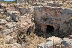 Heated room with hypocaust system and basins from Baths I.