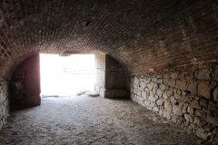 Interior of one of the rooms flanking the south monumental entrance of the amphitheater.