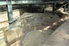 Structures near the entrance (under the restrooms) of the archaeological area.
