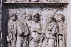 Detail from the Arch of Trajan of the lower left pier relief on the north side depicting Trajan with Jupiter receiving a pledge of loyalty from the Germans.