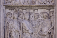 Detail from the Arch of Trajan of the lower left pier relief on the south side depicting Trajan entering Rome in 99 CE.