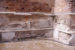 Marble revetment in the north hall of the theater.