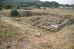 Small temple to the north of the Capitolium and unidentified building.