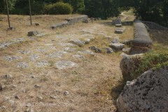 Decumanus maximus leading from the Via Flaminia to the amphitheater area.