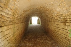 Large channel leading from the area area between the theater and amphitheater into a cistern.