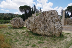 Chunks of conglomerated building material from the monumental arched entryway.