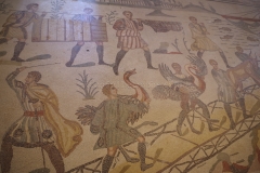 Detail of the Great Hunt mosaic with a scene of ostriches being loaded onto a boat.