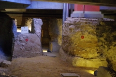 Water channel and foundations of a pillar for the west portico of the forum.
