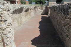 Cryptoporticus without intact roof from the baths at Complutum.