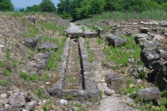 Water channel under the cardo running along the west side of the forum.