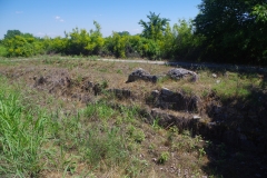 Original western walls running north from the interior circuit intersection.