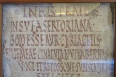 Painted plaster notice transferring the rights of the Insula Sertoriana (second line) from a father to his daughter, Auria Cyriacetis. Found near the Forum Boarium in Rome. Now in the Musei Vaticani.