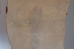 Boundary marker for Juliobriga and Legio IV Macedonica on display at the Arqueositio Cántabro-Romano de Camesa-Rebolledo.
