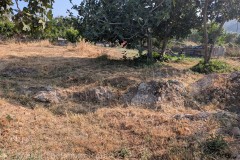 Rubble in the lot next to the house with a bathing complex (along Theocharaki).