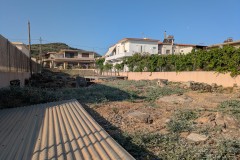 Urban villa and Early Christian cemetery from the dirt road on the north side.
