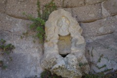 Detail of the relief of Pan from the fountain on the lower terrace. Detail of the relief of Pan from the fountain on the lower terrace.