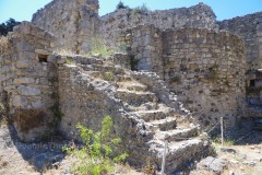 Platform and staircase of the large baths on the lower terrace from the level below the lower terrace. Platform and staircase of the large baths on the lower terrace from the level below the lower terrace.
