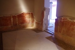Fresco decoration on the remaining walls of a room near the northwest atrium in the Casa Romana.