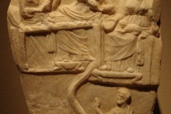 Votive relief depicting a nekrodeipno and Cybele. Dated to around 350 BCE. Casa Romana.