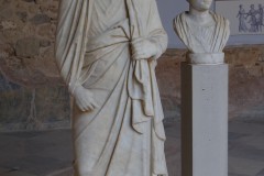 Marble portraits and a statue on display in the exedra off the northwest atrium. Dated between the 1st century BCE and 2nd century CE.